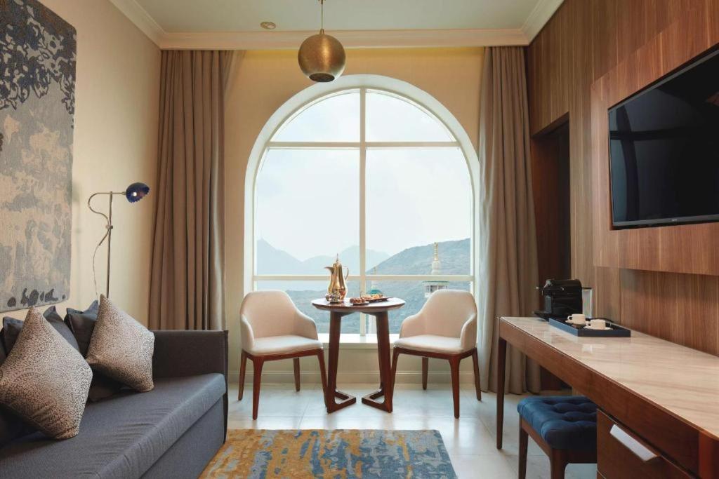 Guest room with arched window